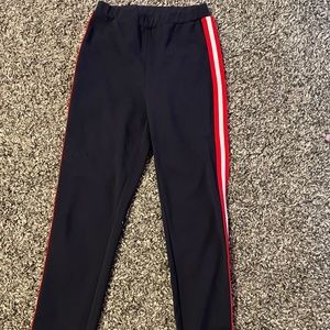 Blue leggings with red stripe